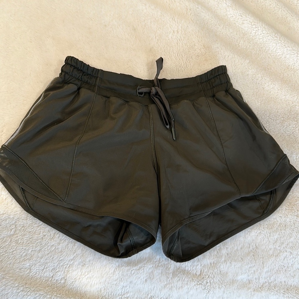 Lululemon size 4 tall shorts green color